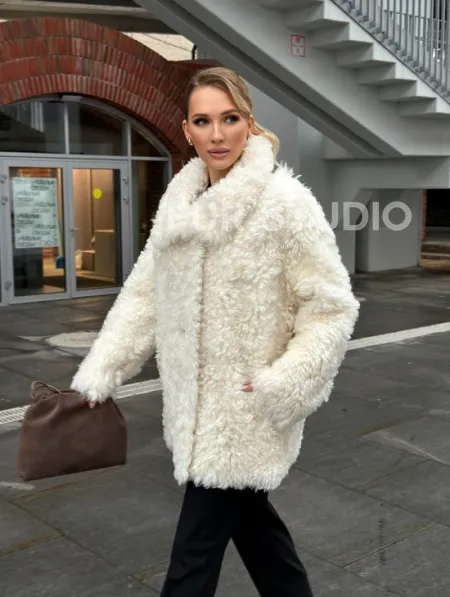 Белая шубка из тиградо - фото 18