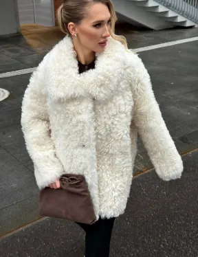 Белая шубка из тиградо - фото 8